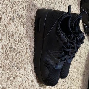 Black kids Nike shoes